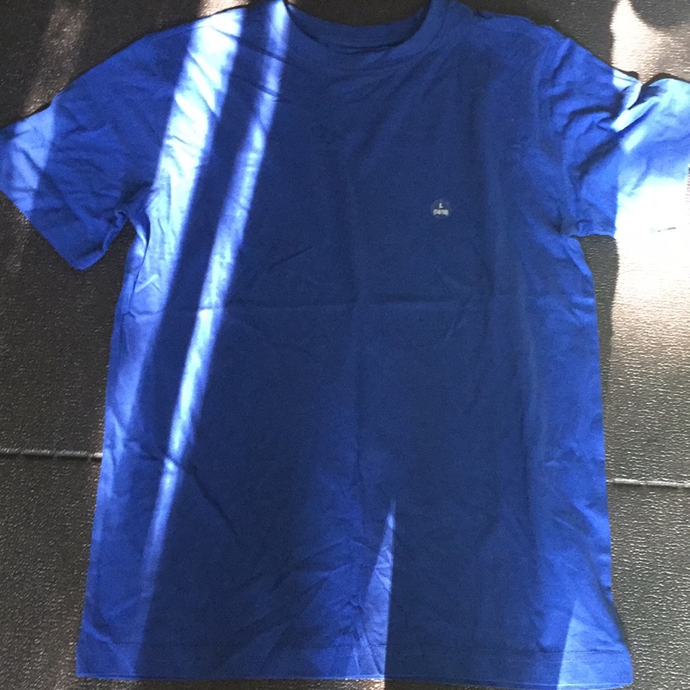 Plain blue T- Shirt.